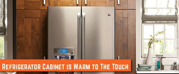 Refrigerator cabinet is warm to the touch
