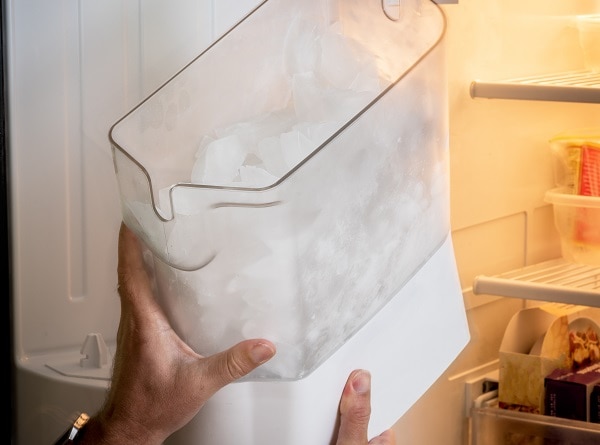 how to clean GE refrigerator ice maker